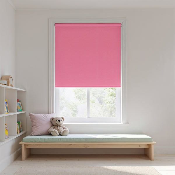 Window with pink roller blind, wooden bench, and teddy bear in a room.